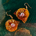Marigold earrings with mini daisies